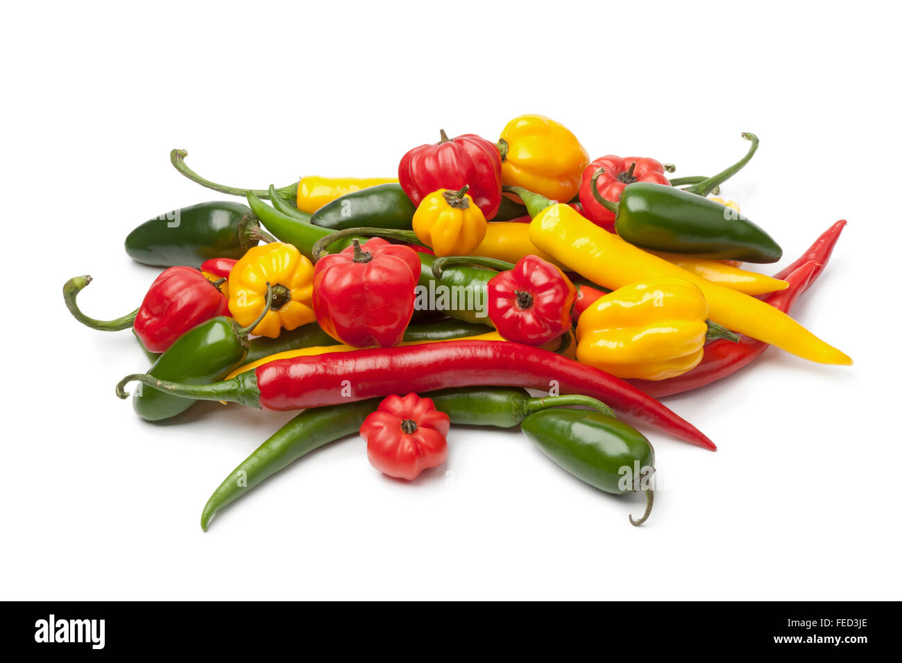 Mix of fresh hot chili peppers on white background Stock Photo Alamy