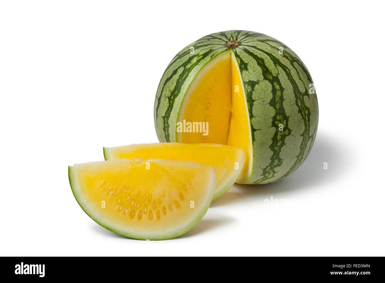 Fresh seedless yellow watermelon on white background Stock Photo