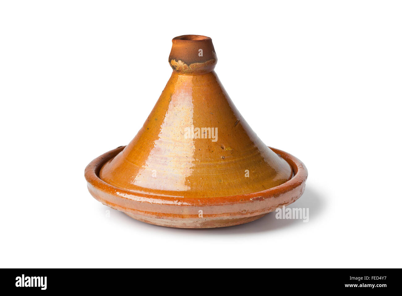 Simple traditional Moroccan tagine on white background Stock Photo