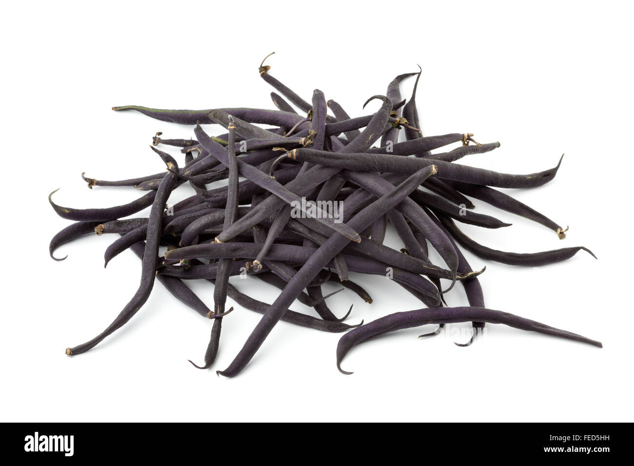 Heap of fresh haricots noir beans on white background Stock Photo