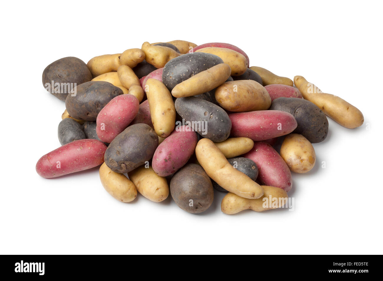 Variety of heirloom gourmet potatoes on white background Stock Photo
