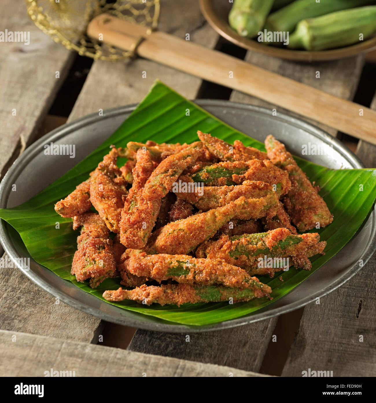 Kurkuri bhindi . Spicy fried okra. India Food Stock Photo