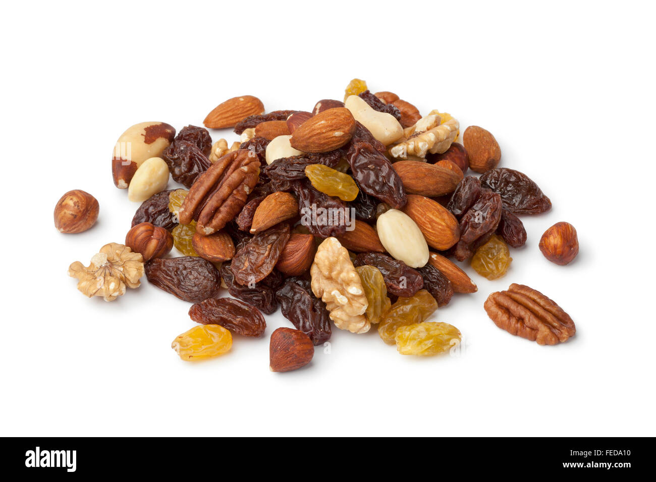 Heap of raisons and nuts on white background Stock Photo