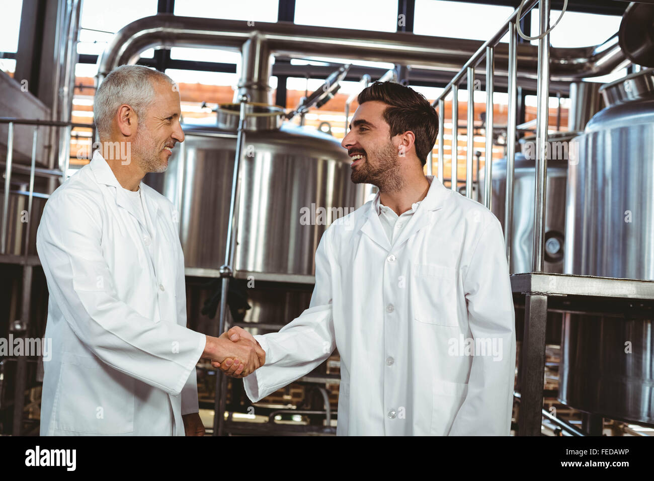 Team of brewers working together Stock Photo Alamy