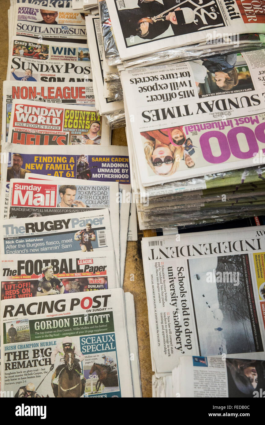 A selection of British newspapers,both broadsheets and redtops,in a