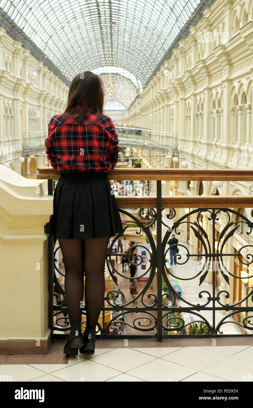 Girl looking forward, view from the back Stock Photo
