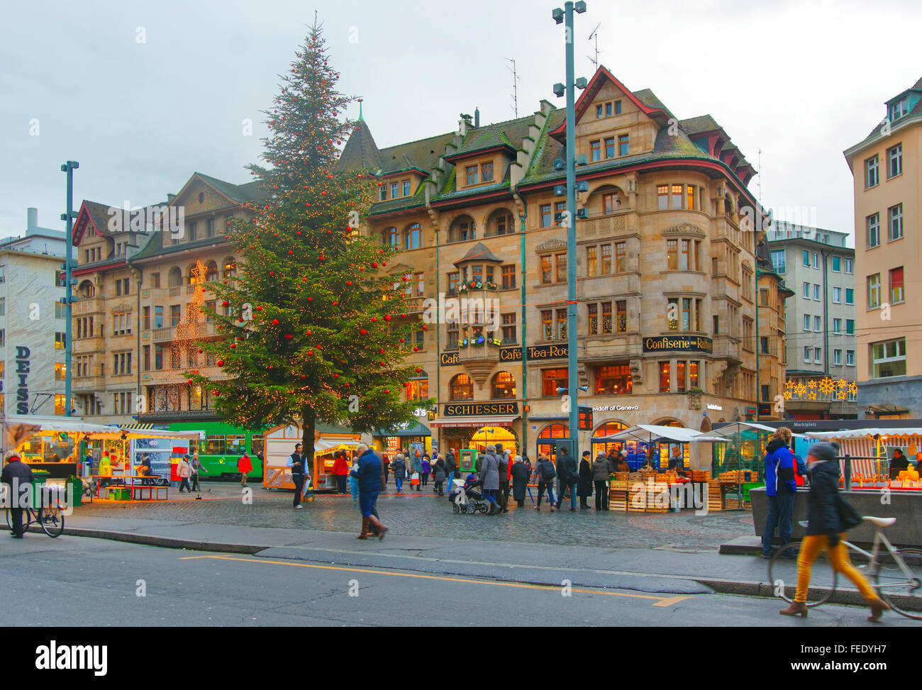 BASEL, SWITZERLAND - JANUARY 1, 2014: Street view of Marktplatz in the Old City of Basel. Basel is a third most populous city in Switzerland. It is located on the river Rhine. Stock Photo