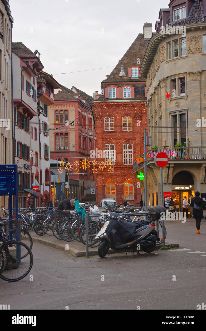 BASEL, SWITZERLAND - JANUARY 1, 2014: Street view with Christmas decoration in Old City in Basel. Basel is a third most populous city in Switzerland. It is located on the river Rhine. Stock Photo