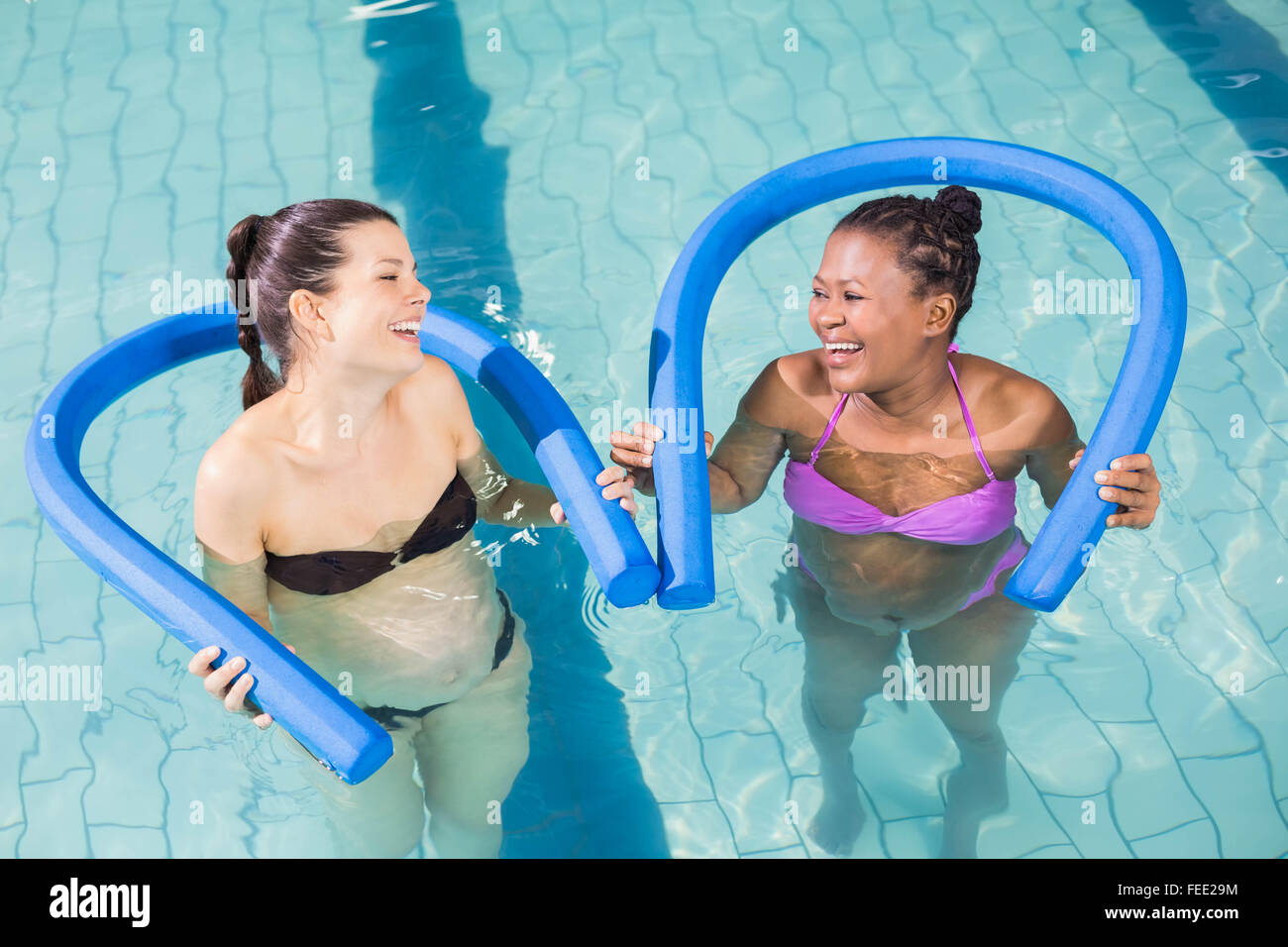Pregnant women exercising with foam rollers Stock Photo Alamy