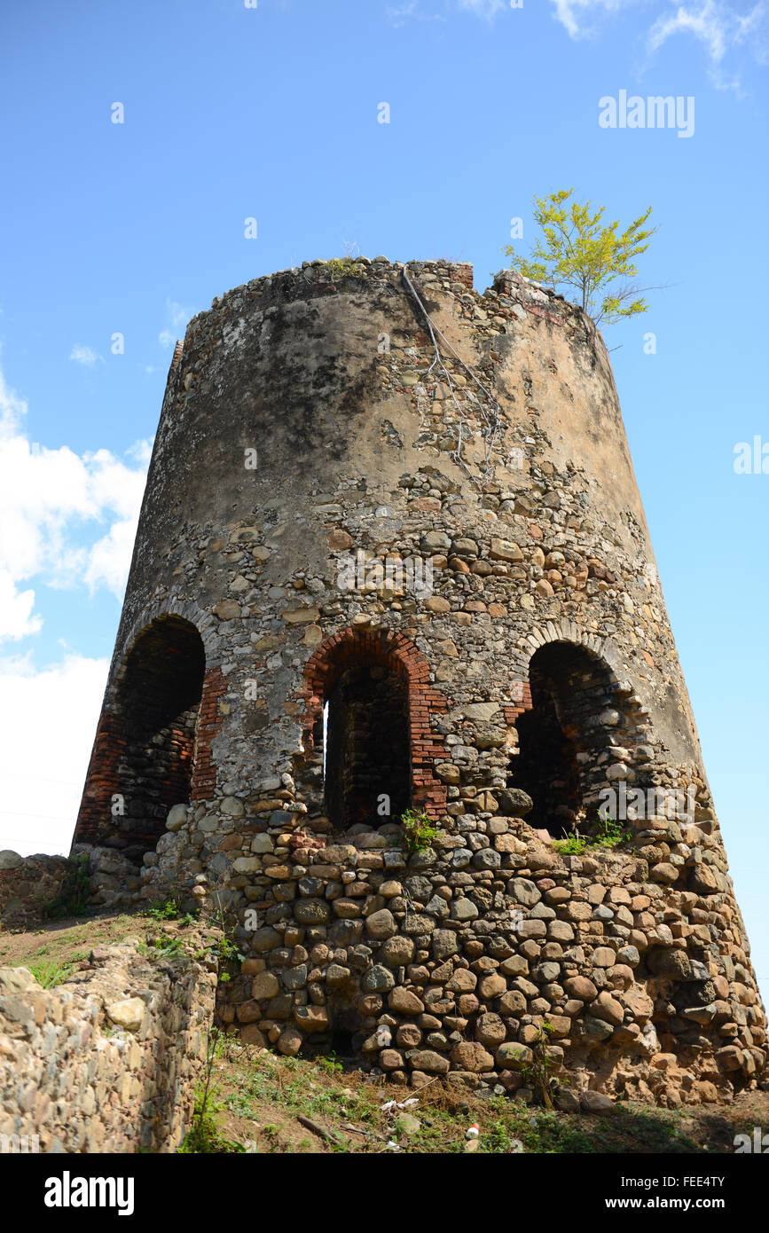 Ruins of a sugarmill chimney. Arroyo, Puerto Rico. Caribbean Island. US territory. Stock Photo