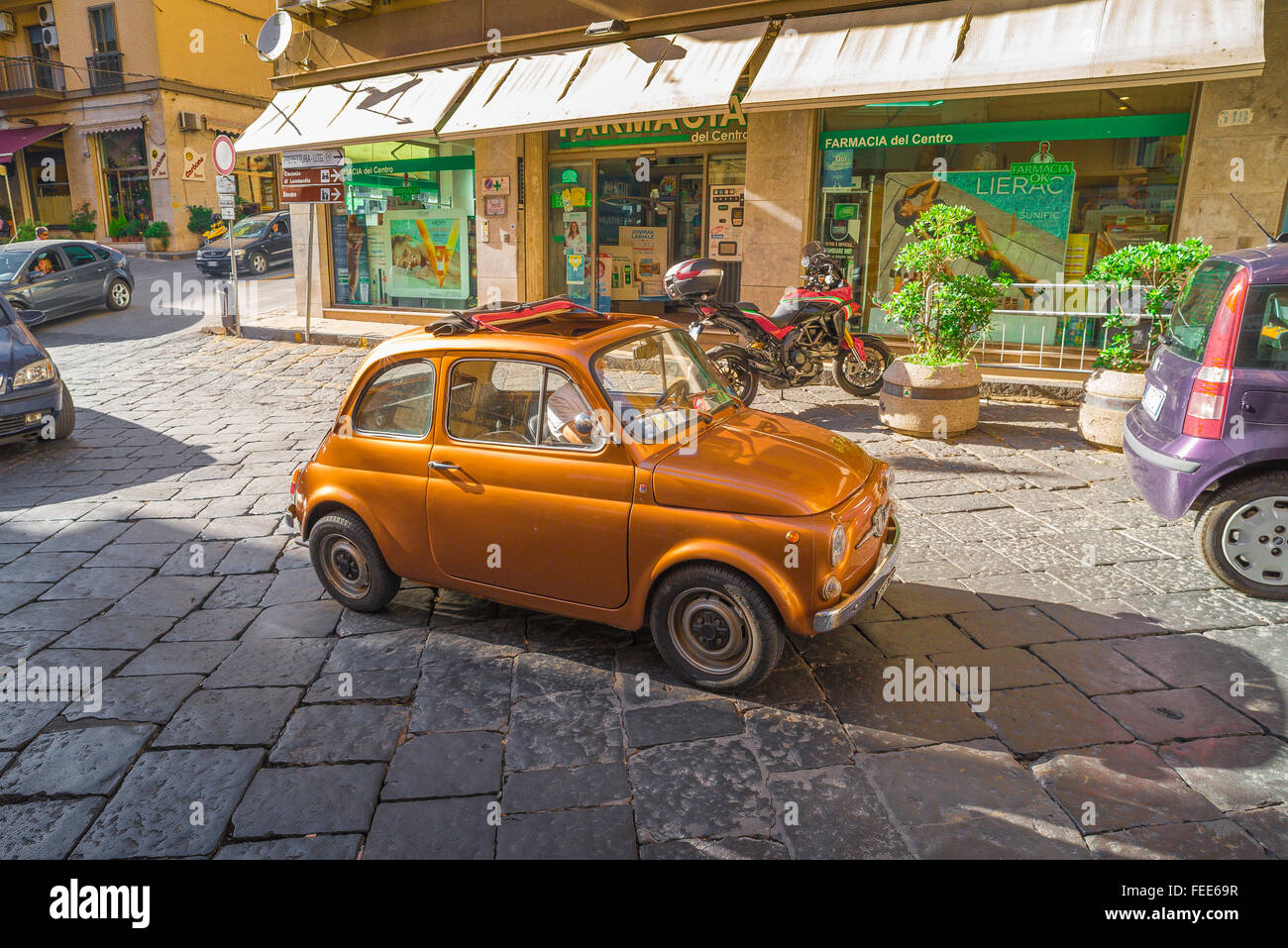 Fiat 500 Italy, view of a classic Fiat 500 Cinquecento in the Via Roma, Enna, Sicily. Stock Photo