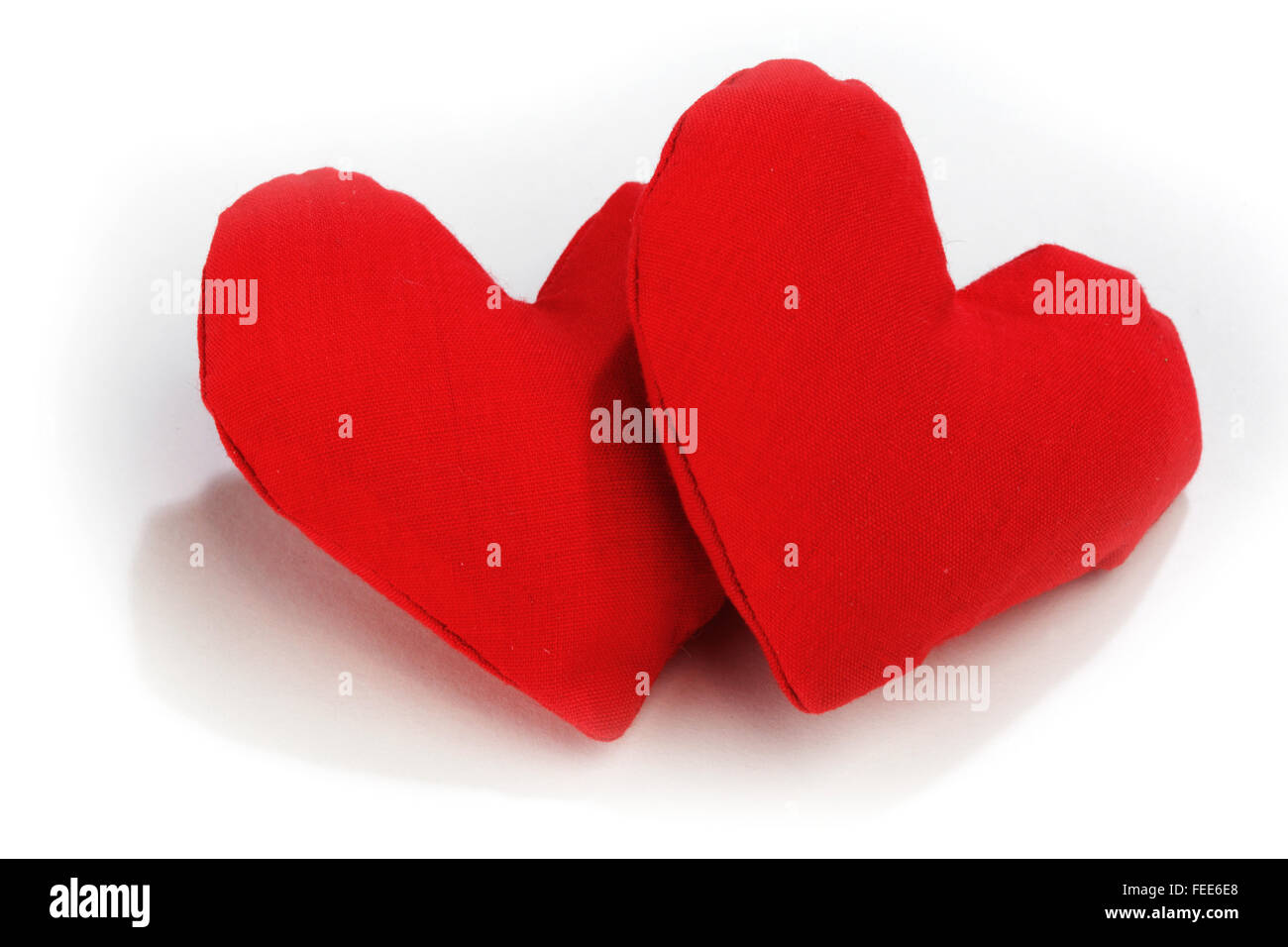 Textile red hearts isolated on white background Stock Photo - Alamy