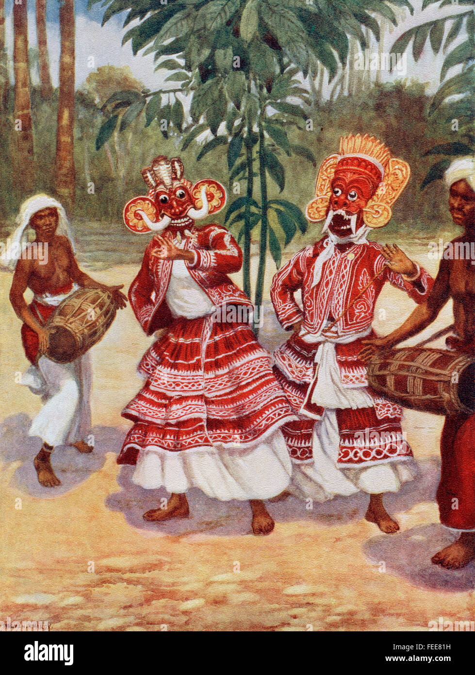 Sinhalese Devil Dancers on the island of Sri Lanka, Asia. The dancers wear masks which represent the demons who are appeased by them in times of sickness. Stock Photo