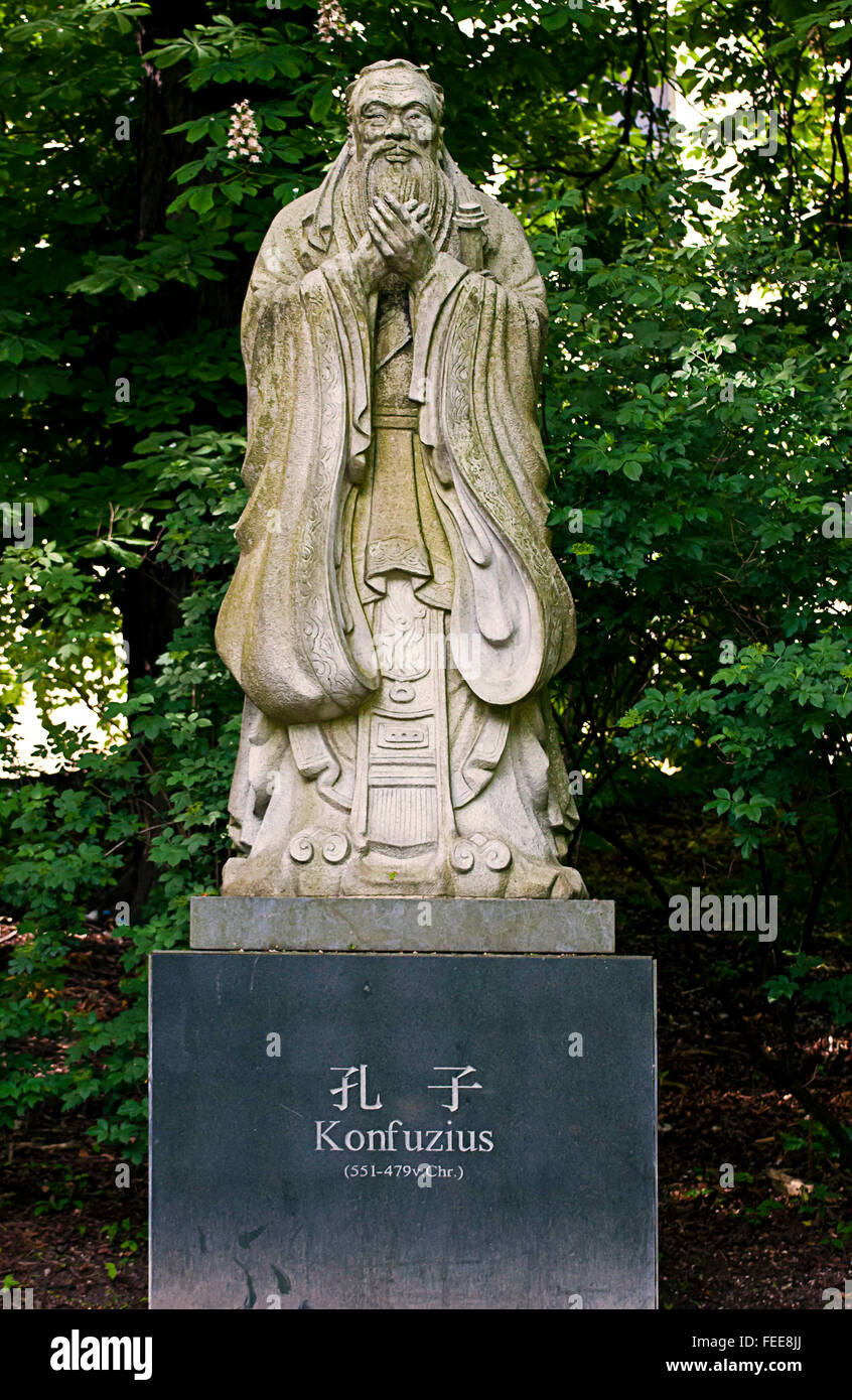 Confucius actual size statue at Dichtergarten (poets garden) in  Munich,small romantic park near Hofgarten. Stock Photo