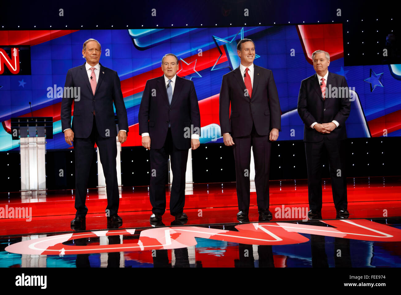 LAS VEGAS, NV, Dec 15, 2015, Republican presidential candidates at the 'kids table' pose for class picture - (L-R) George Pataki, Mike Huckabee, Rick Santorum and Sen. Lindsey Graham (R-SC) during the CNN presidential debate at The Venetian Las Vegas Stock Photo