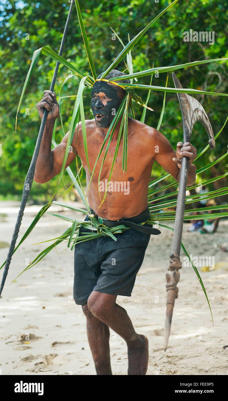 Man dressed as warrior to 'greet' visitors, Owa Raha Island (Santa Ana), Solomon Islands, Melanesia Stock Photo