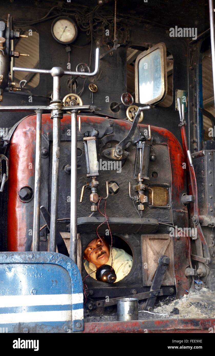 Cleaning out the firebox at the Darjeeling Railway Stock Photo