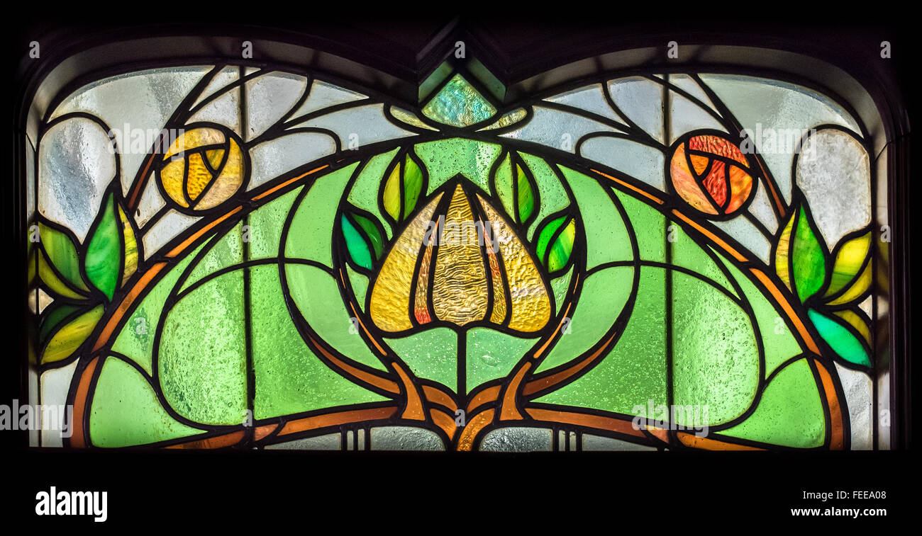 Ornate Victorian stained glass flower design. Stock Photo