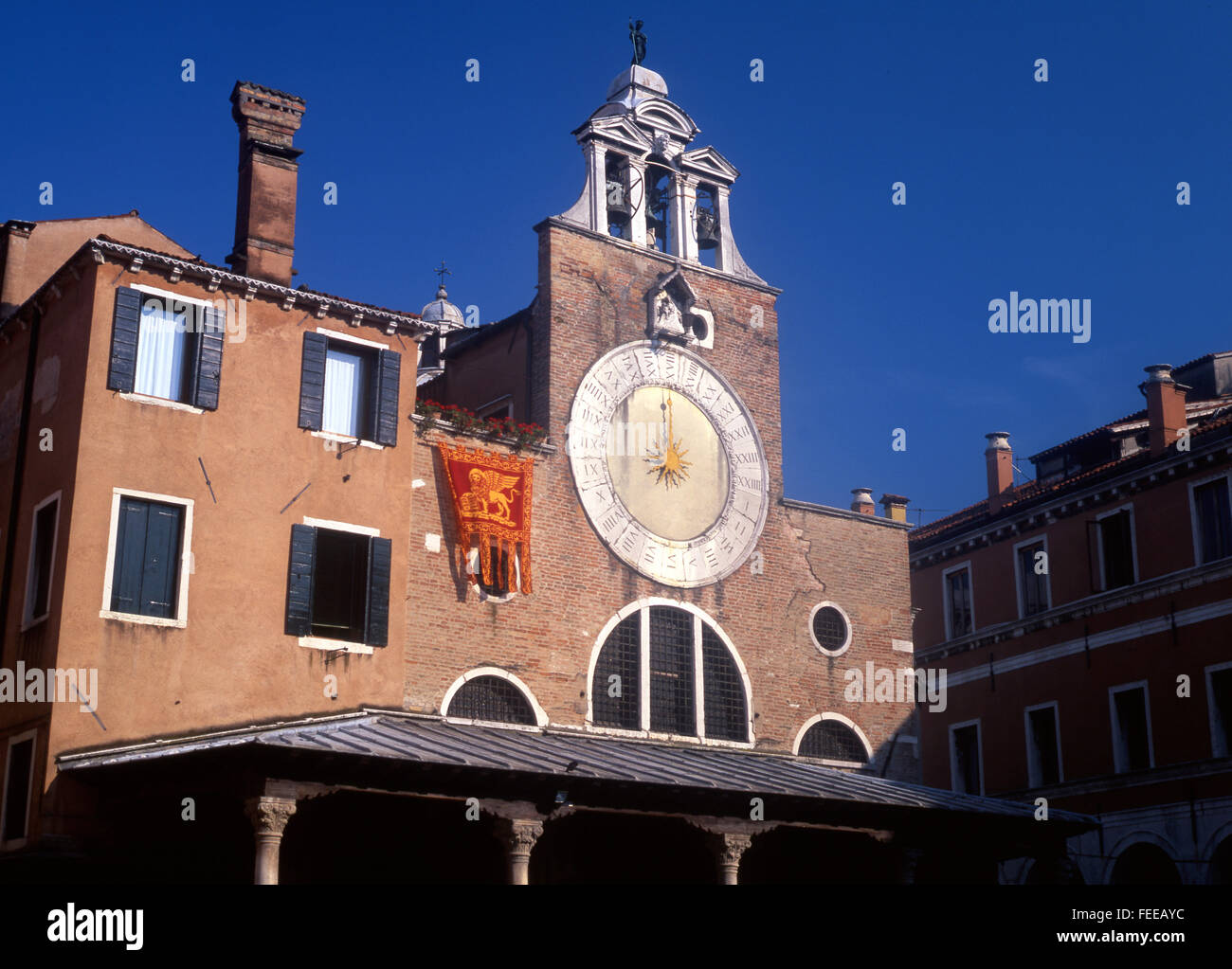 Venice Venezia San Giacomo di Rialto church facade front with astrological clock Venice Veneto Italy Stock Photo