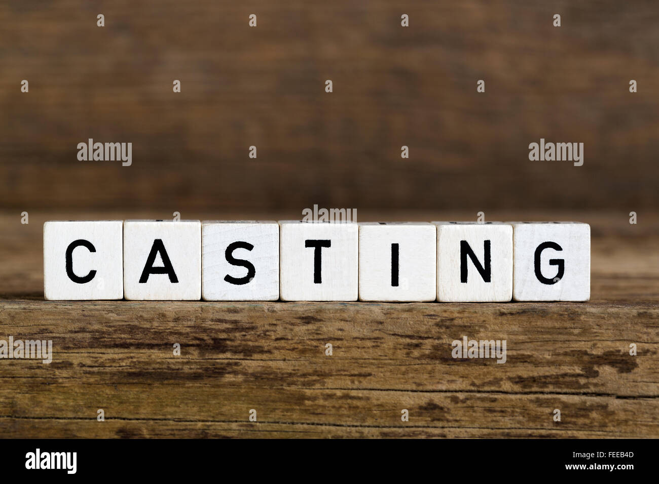 The word casting written in cubes on a wooden background Stock Photo