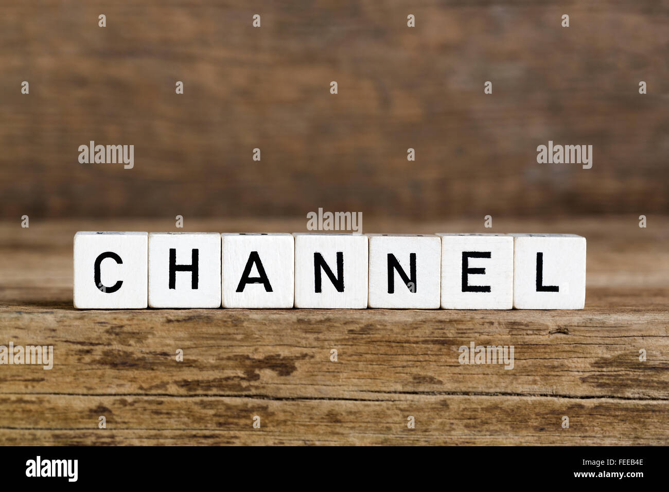The word channel  written in cubes on a wooden background Stock Photo