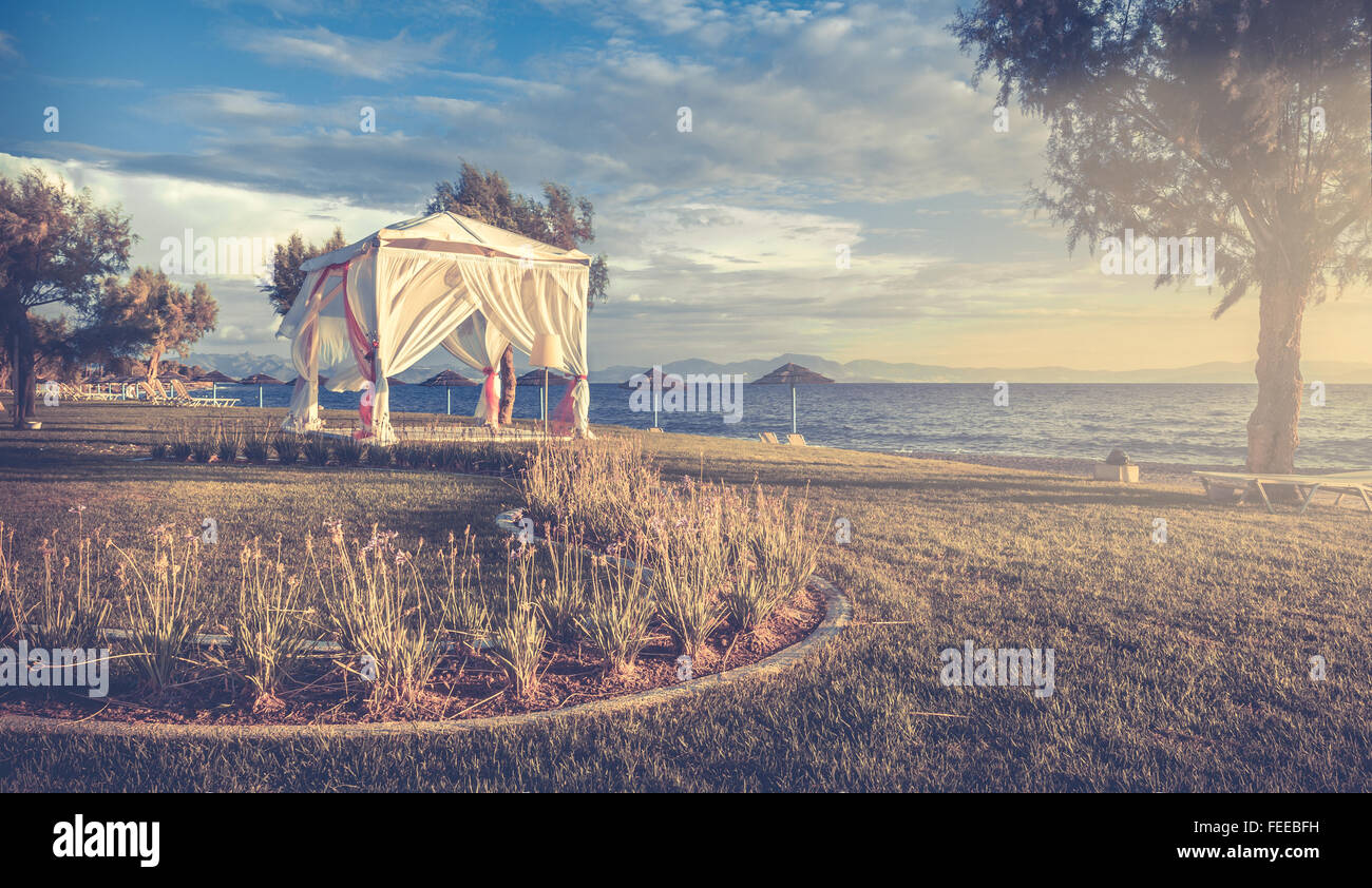 Wedding altar on greek coastline at sunrise Stock Photo