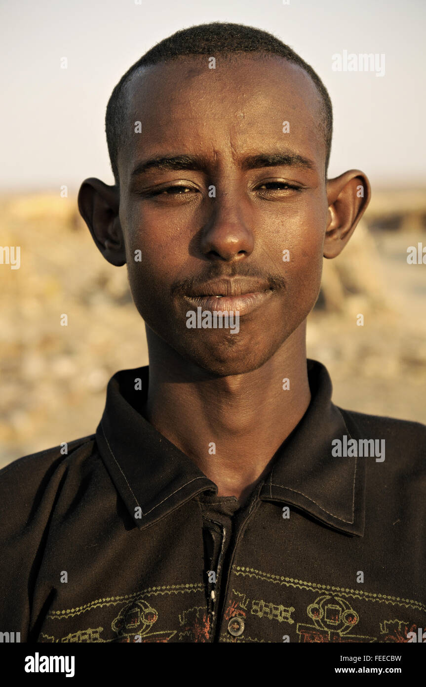 Head portrait of a young african man in the village of Ahmed Ela, Danakil depression, Afar Region, Ethiopia Stock Photo