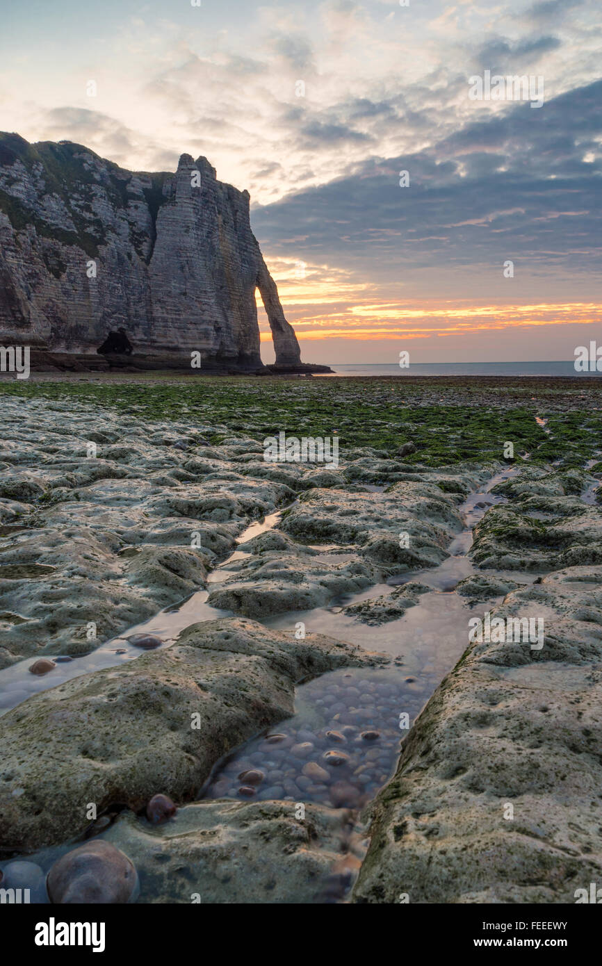 Etretat rocks and arch in the background Stock Photo - Alamy