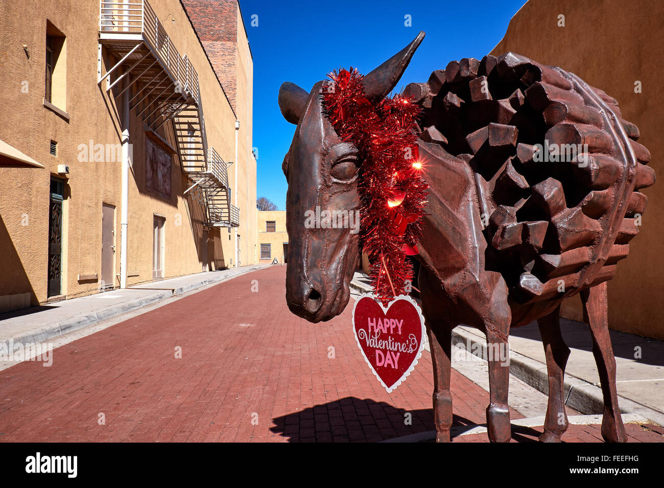 Sculpture in Burro Alley, Santa Fe, New Mexico, decorated for Valentine's Day Stock Photo
