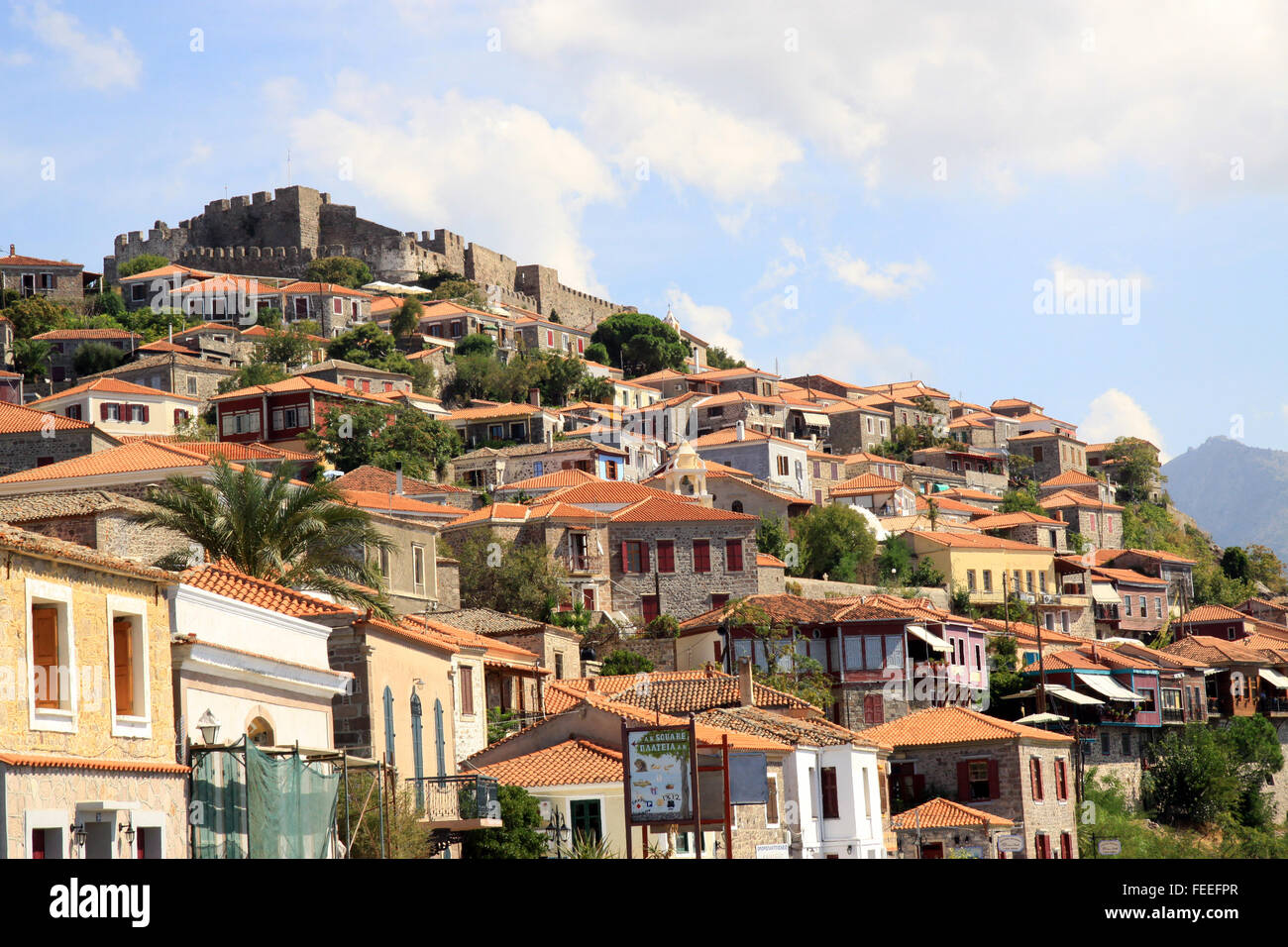 The medieval Greek castle of Mithymna on the hillside above the North Aegean sea resort town of Molyvos on the island of Lesbos Greece Stock Photo