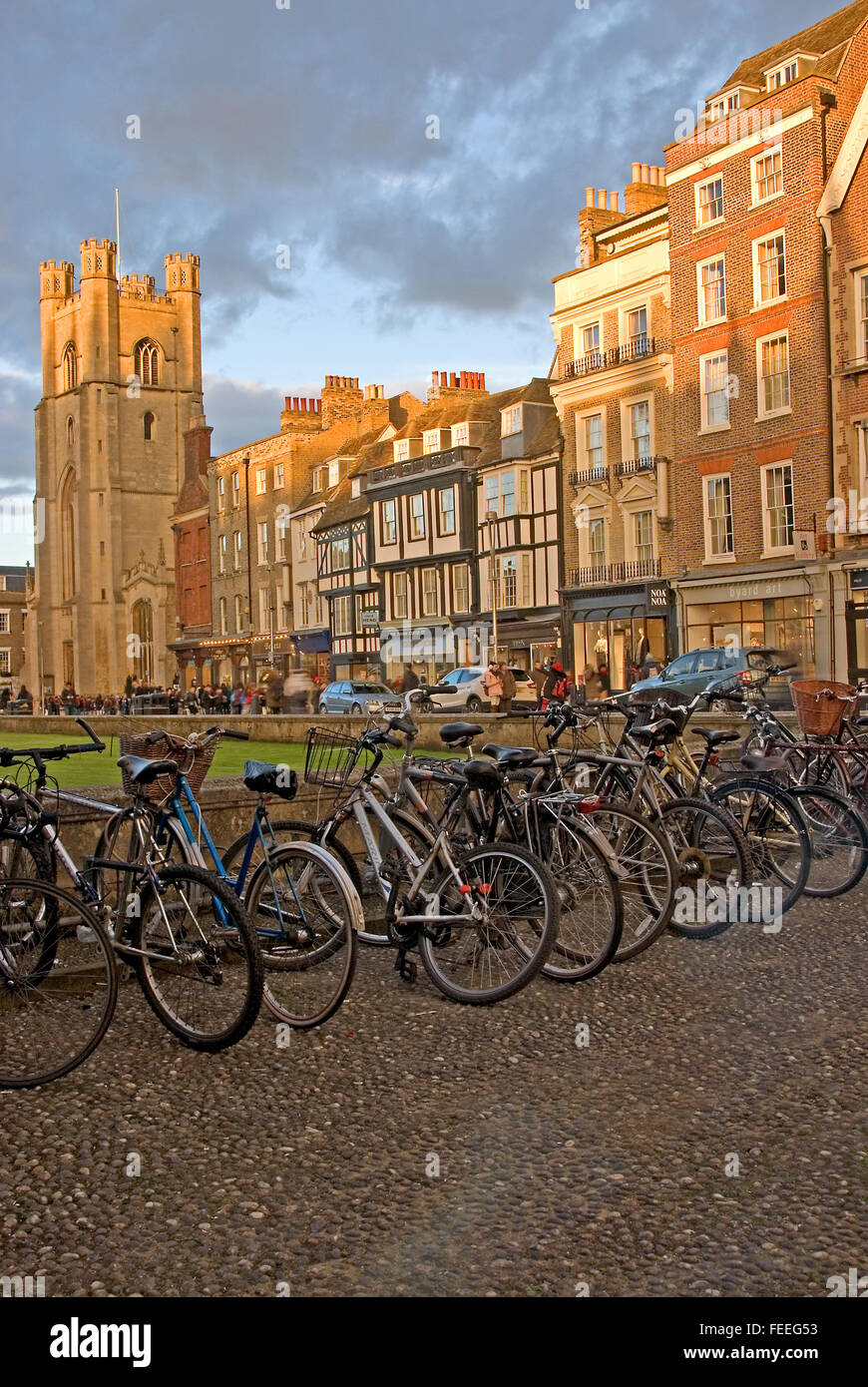 Bikes parked outside a college entrance in Cambridge city centre Stock Photo