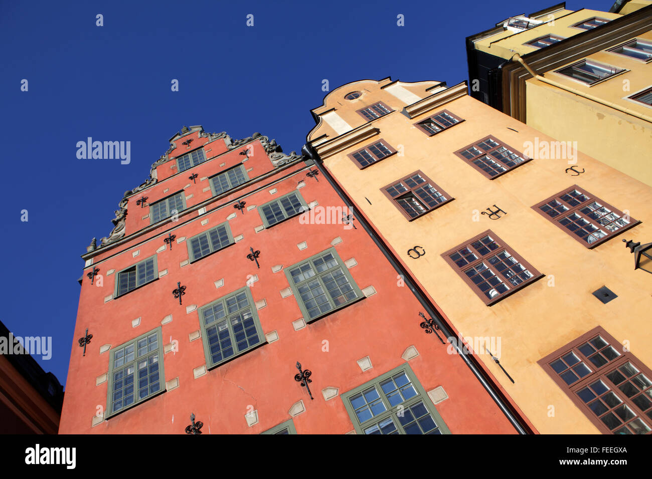 Buildings number 18 and 22 in Stortorget Square, Gamla Stan, Stockholm, Sweden Stock Photo