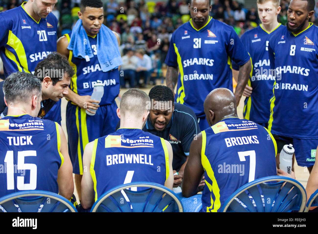 London, UK. 5th February 2016. The Sheffield Sharks team and their coaches talk tactics after falling behind in the fourth quarter during the London Lions vs. Sheffield Sharks BBL game at the Copper Box Arena in the Olympic Park. London Lions win 90-84 Credit:  Imageplotter News and Sports/Alamy Live News Stock Photo