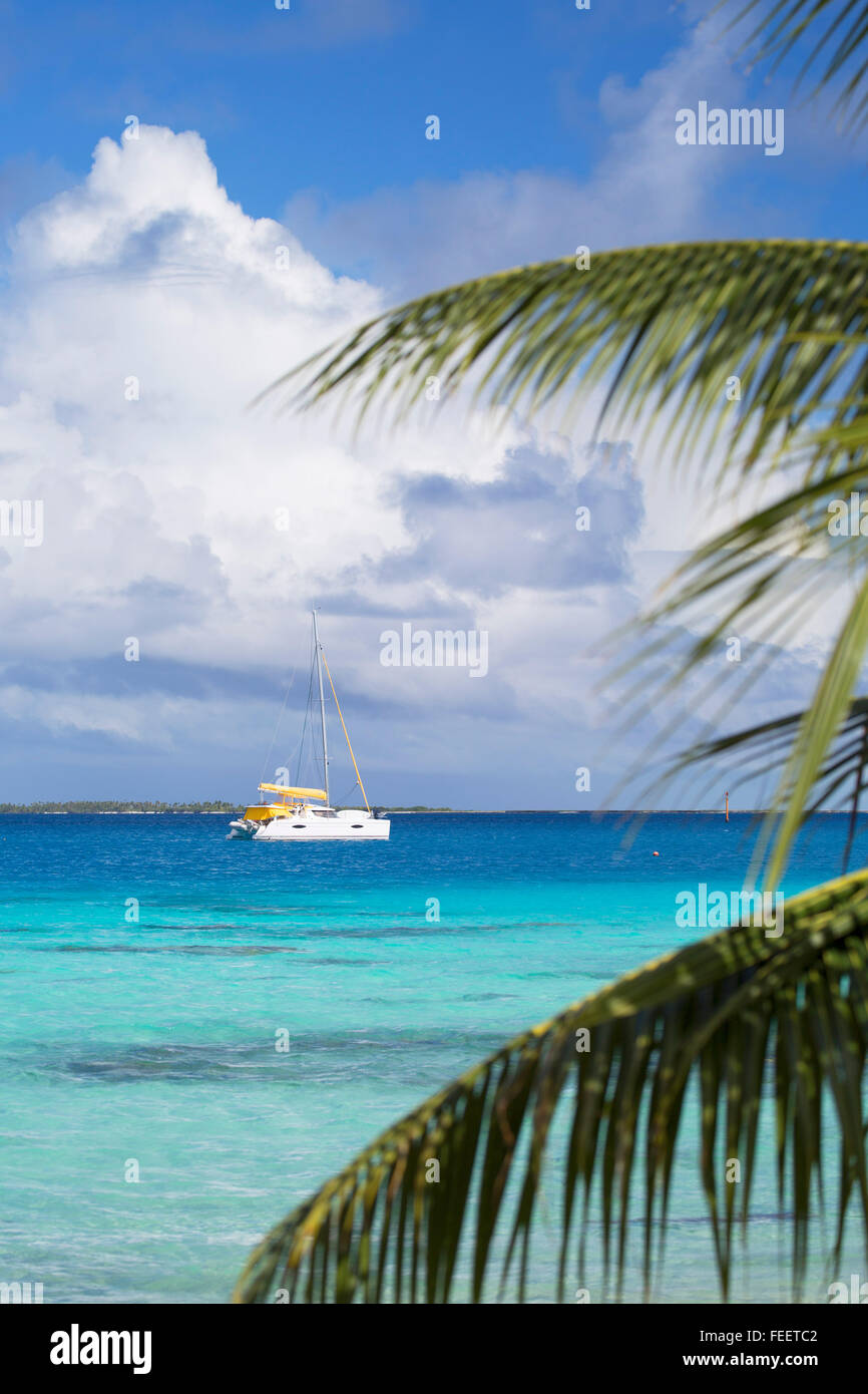 Yacht on lagoon, Fakarava, Tuamotu Islands, French Polynesia Stock Photo