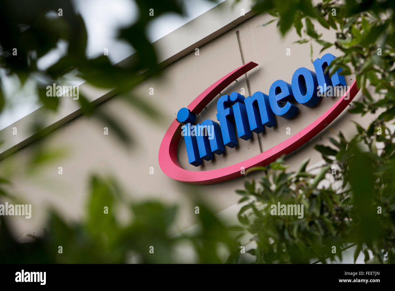 A logo sign outside of a facility occupied by Infineon Technologies in Milpitas, California on January 23, 2016. Stock Photo