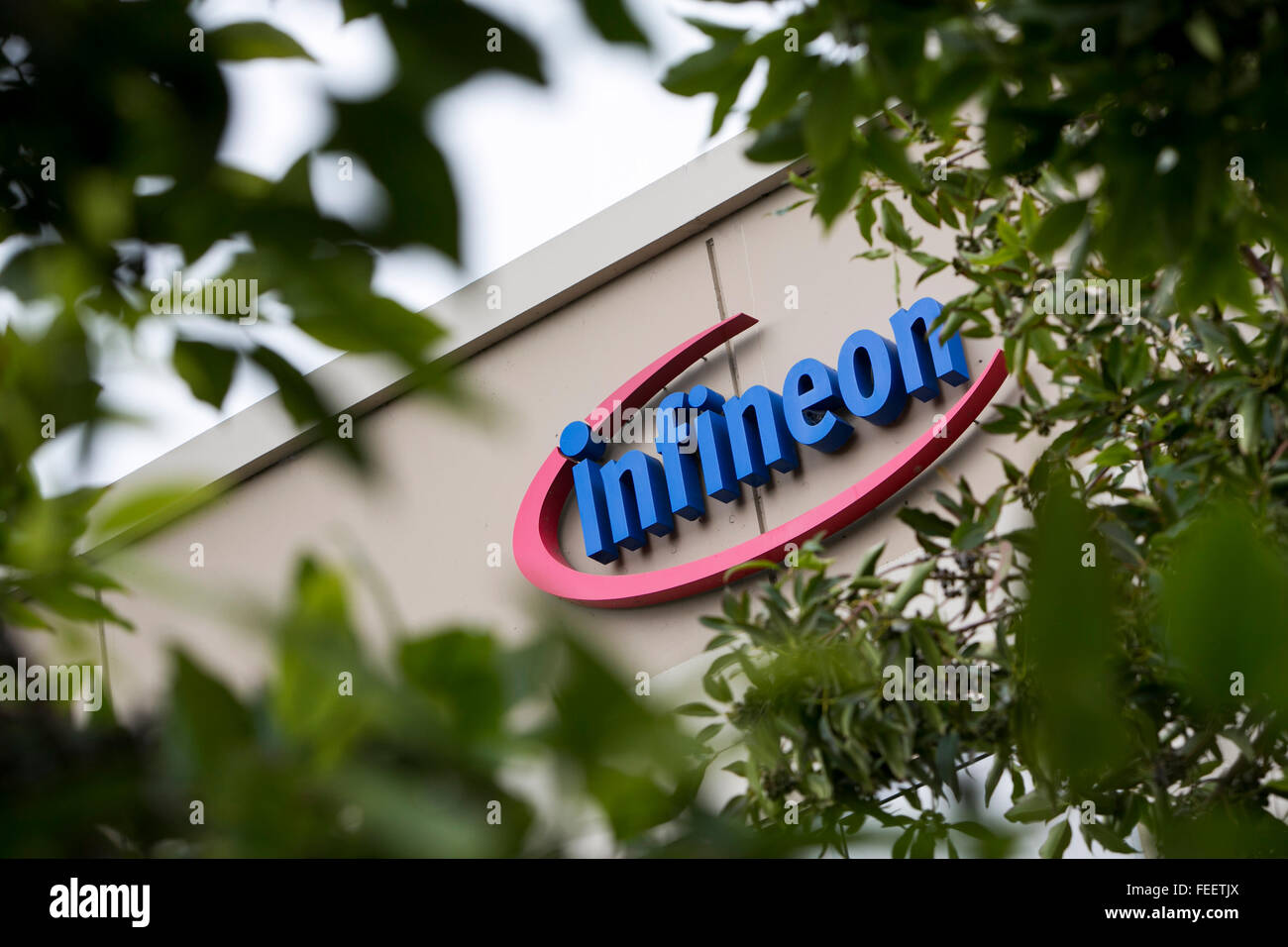 A logo sign outside of a facility occupied by Infineon Technologies in Milpitas, California on January 23, 2016. Stock Photo