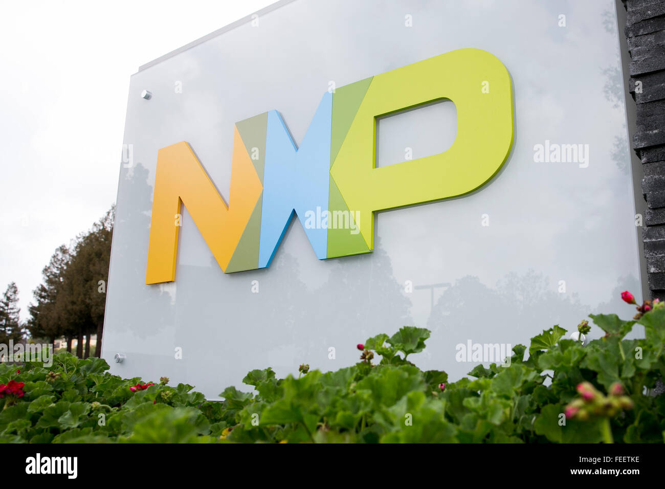 A logo sign outside of a facility occupied by NXP Semiconductors in San