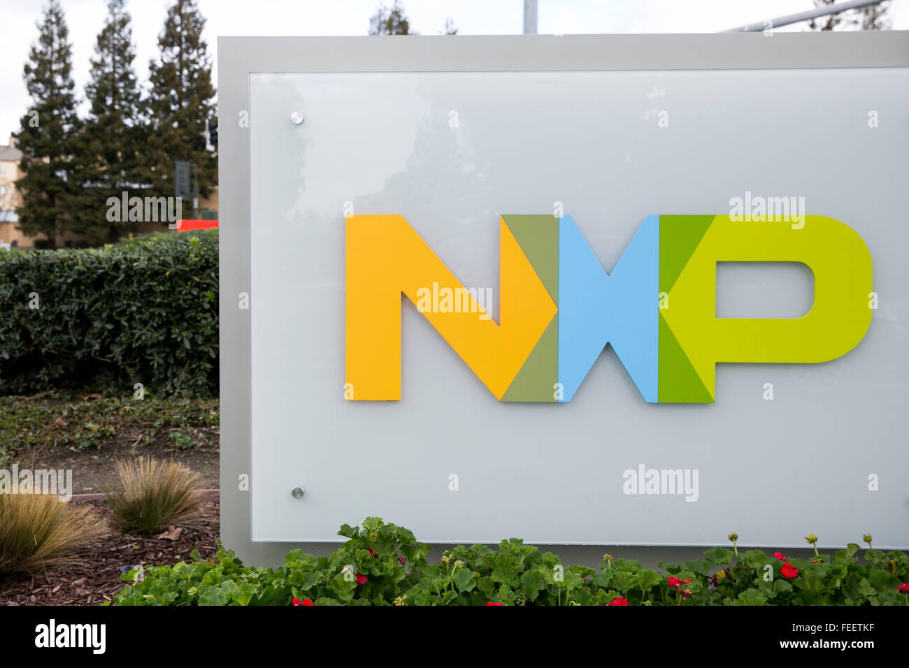 A logo sign outside of a facility occupied by NXP Semiconductors in San ...