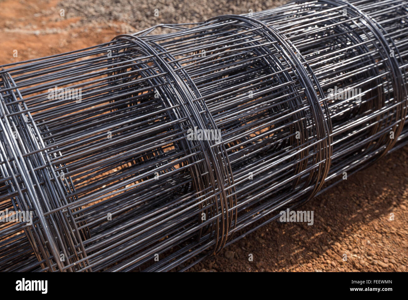 roll of wire mesh on construction site Stock Photo