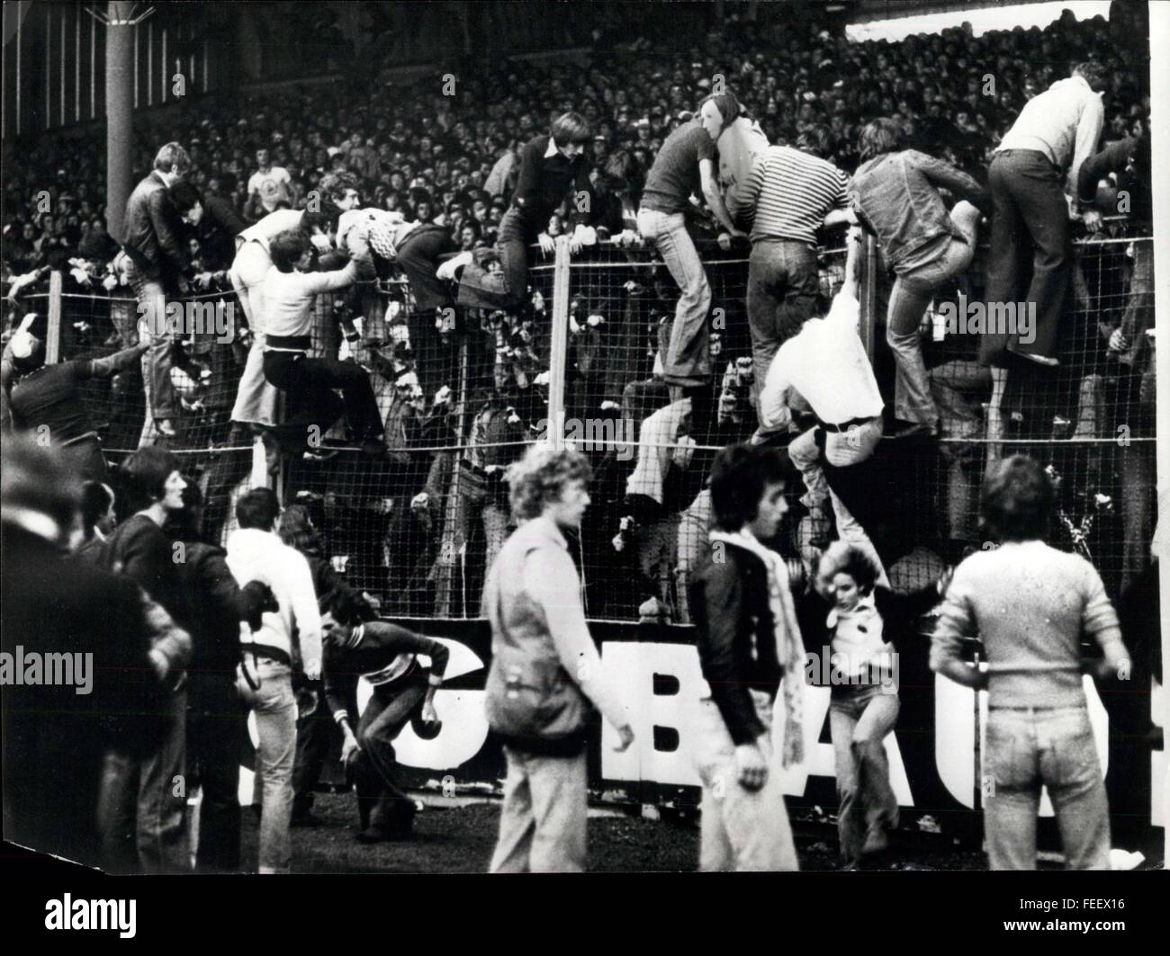 1973 - Manchester United Barred From Europe: Owing to the violent rioting by the Manchester United supporters in the match between Manchester United and St. Etienne they have been suspended by Union of European Football Association. Photo Shows: Rioting fans climb over the barriers during the match in France. © Keystone Pictures USA/ZUMAPRESS.com/Alamy Live News Stock Photo