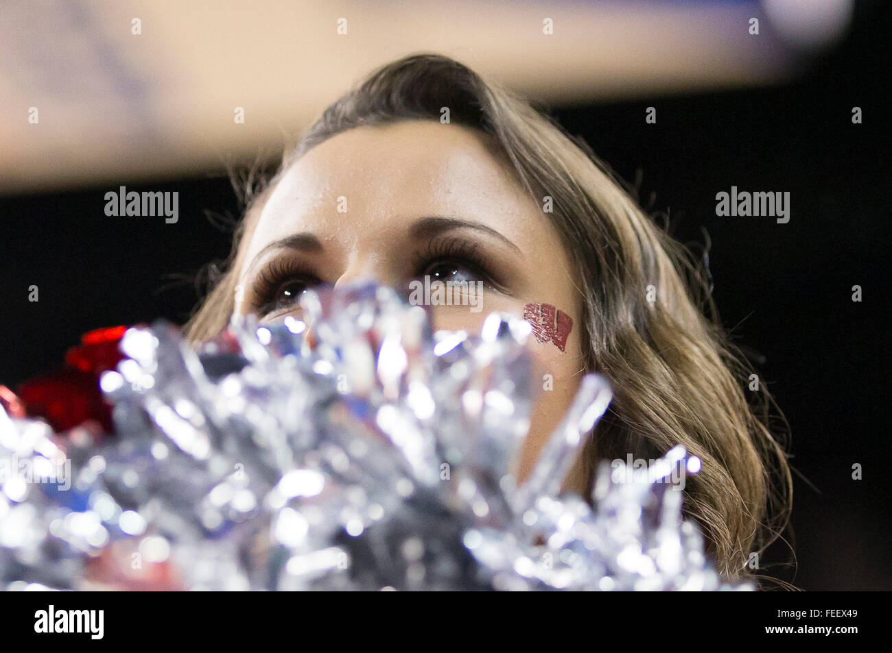 Madison, WI, USA. 4th Feb, 2016. Wisconsin cheerleader looks on during the NCAA Basketball game between the Ohio State Buckeyes and the Wisconsin Badgers at the Kohl Center in Madison, WI. Wisconsin defeated Ohio State 79-68. John Fisher/CSM/Alamy Live News Stock Photo