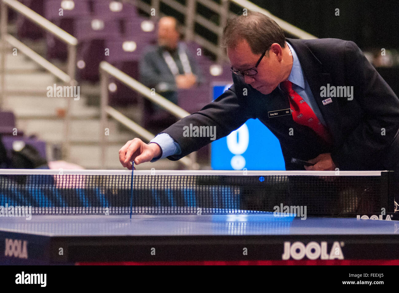 Greensboro, North Carolina, US. 5th Feb, 2016. Feb. 5, 2016 - Greensboro, N.C., USA - Umpire KENNY MOCK inspects the net before the women's final on day two of the 2016 U.S. Olympic Table Tennis Trials. The top three men and women from the trials move on to compete in April at the 2016 North America Olympic Qualification tournament in Ontario, Canada. The 2016 Summer Olympics will be held in Rio De Janeiro, Brazil, Aug. 5-21. © Timothy L. Hale/ZUMA Wire/Alamy Live News Stock Photo