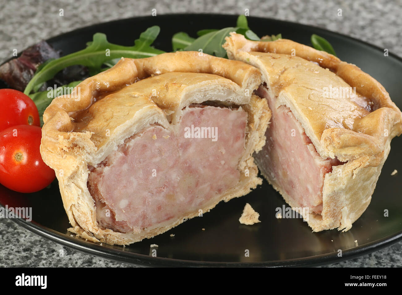 traditional english pork pie wtih side salad Stock Photo Alamy