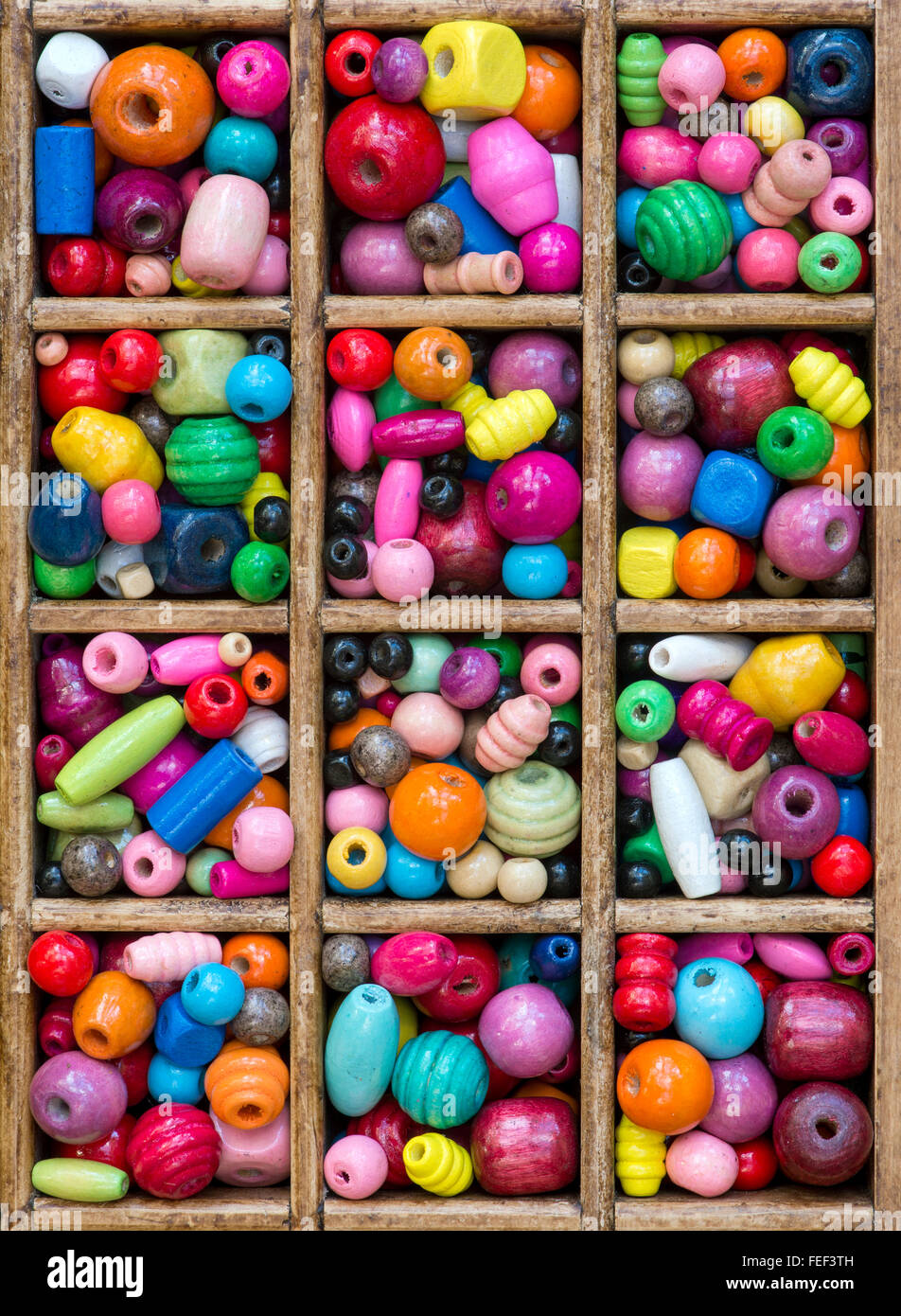 Colourful wooden craft beads pattern Stock Photo - Alamy