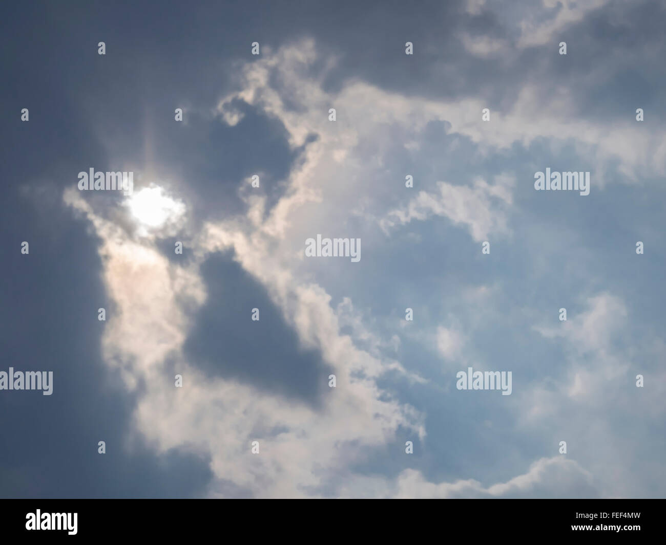 Lights bleeding through clouds Stock Photo Alamy
