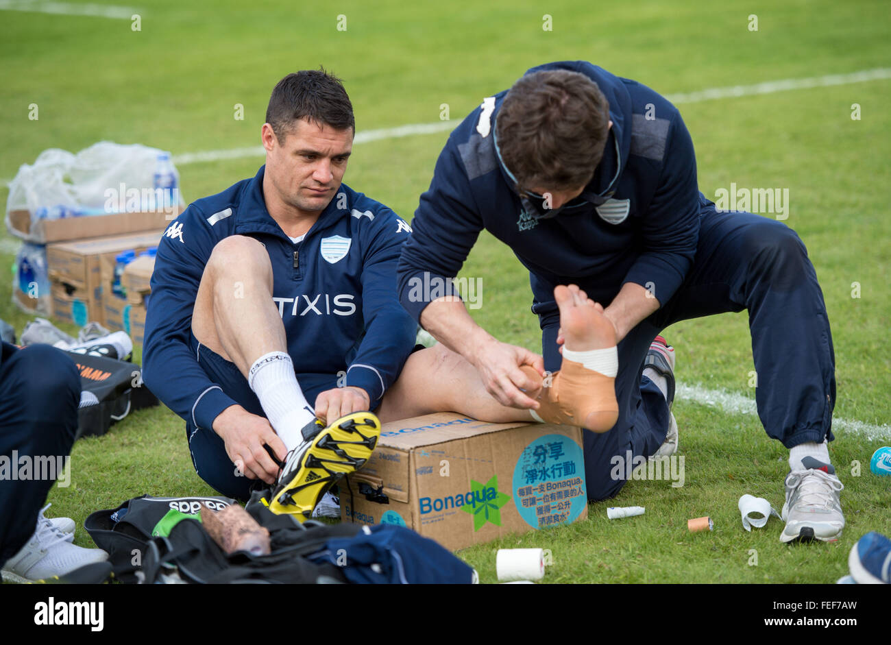 Feb. 5, 2016 - Hong Kong, Hong Kong S.A.R, China - DAN CARTER of the French Rugby union team RACING  92's gets strapped for the last practice session ahead of their clash with New Zealand team, The Highlanders. Racing 92 take the chance to practise on the pitch they will play on in the upcoming match in Hong Kong. They are playing at Sui Sai Wan sports ground in Chai Wan. (Credit Image: © Jayne Russell via ZUMA Wire) Stock Photo