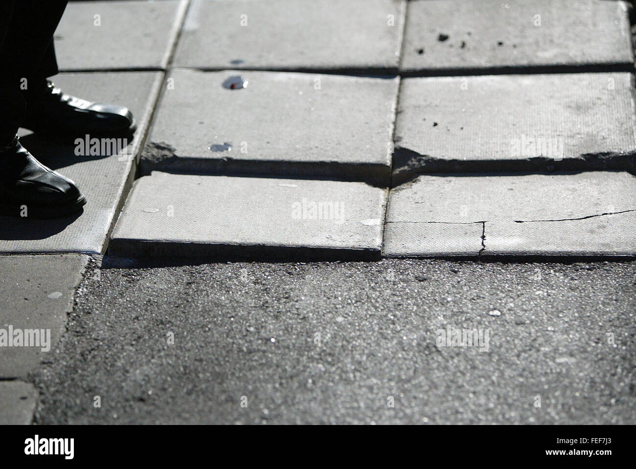 uneven paving stones Stock Photo Alamy