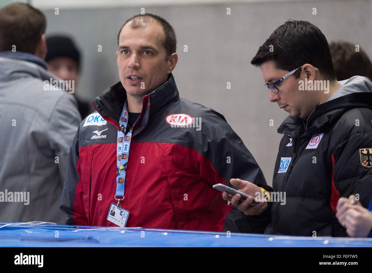 Germany coach Miroslav Boyadzhiev (l) stands next to team manager  Matthias Kulik, as he looks on during the prelimiary rounds of the Shorttrack World Cup in Dresden, Germany, 5 February 2016. Photo:  Sebastian Kahnert/dpa Stock Photo