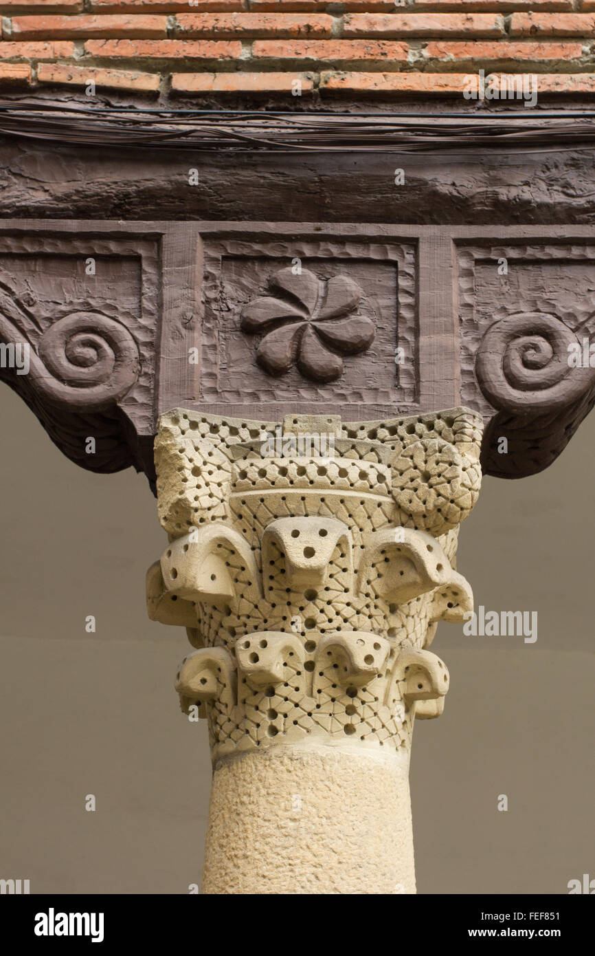 Stone column, wooden timber lintel and bracket with Basque symbol, Hondarribia, Basque area Stock Photo