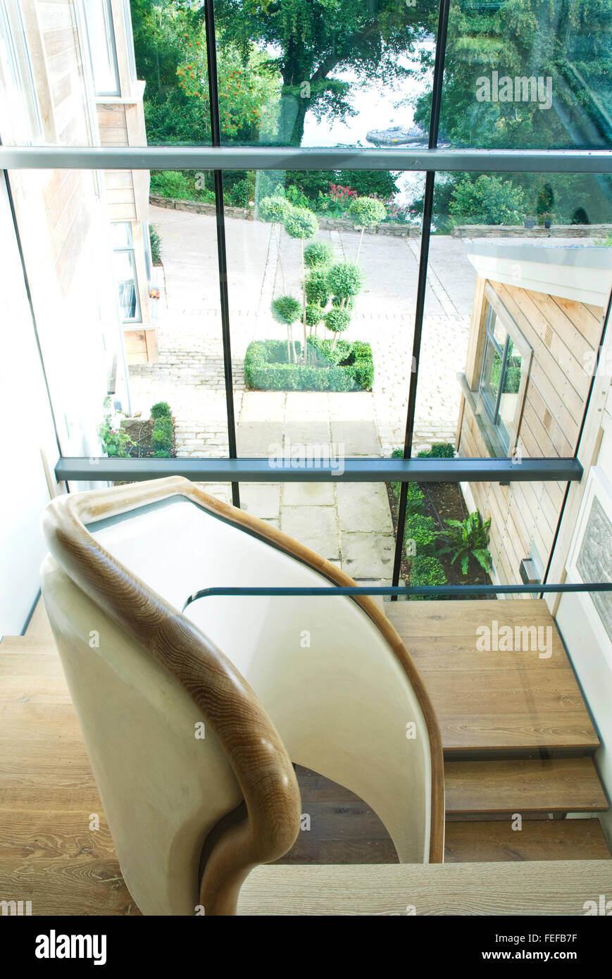 New Glazed widow for staircase, overlooking small courtyard. Stock Photo